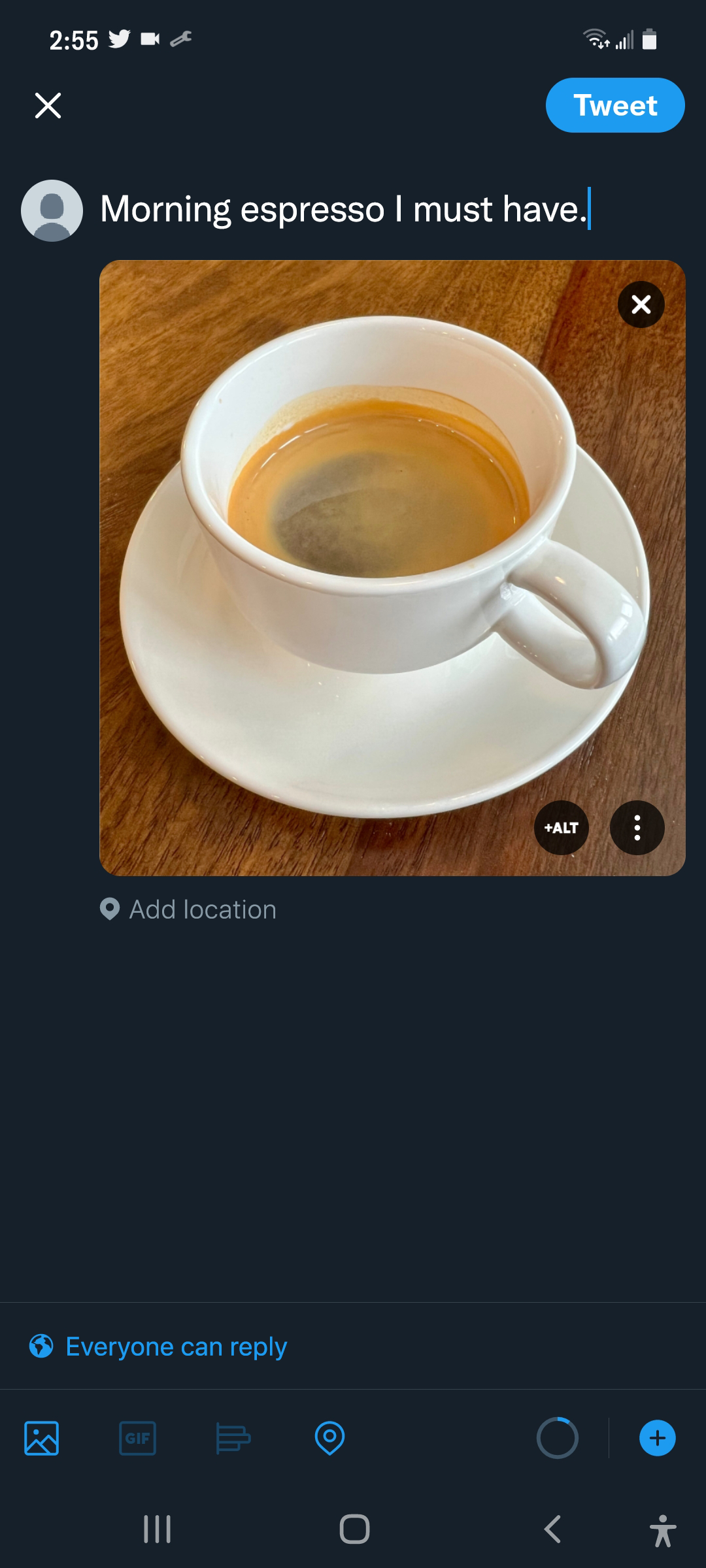 Screenshot of draft Tweet with the text “Morning espresso I must have.” With an uploaded image of a mug of espresso. The add image description button is located at the bottom of the image.